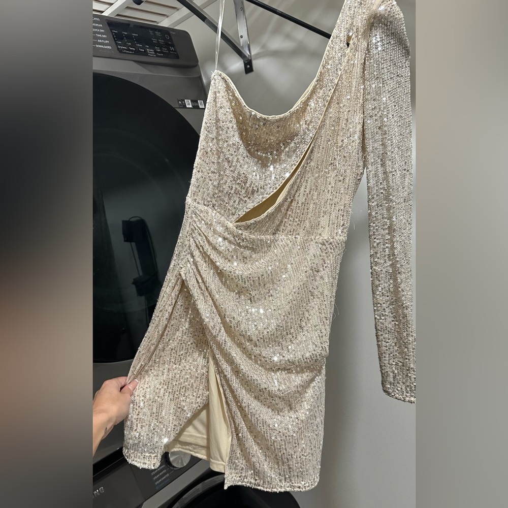 Brand new sparkly dress never worn perfect for new years low cut tight with slit